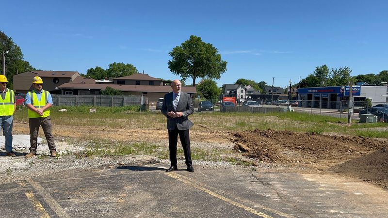 Former North Canton Mayor Stephan Wilder addresses the crowd at a ground-breaking ceremony for the new city fire station at North Main Street and Viking Street NW.