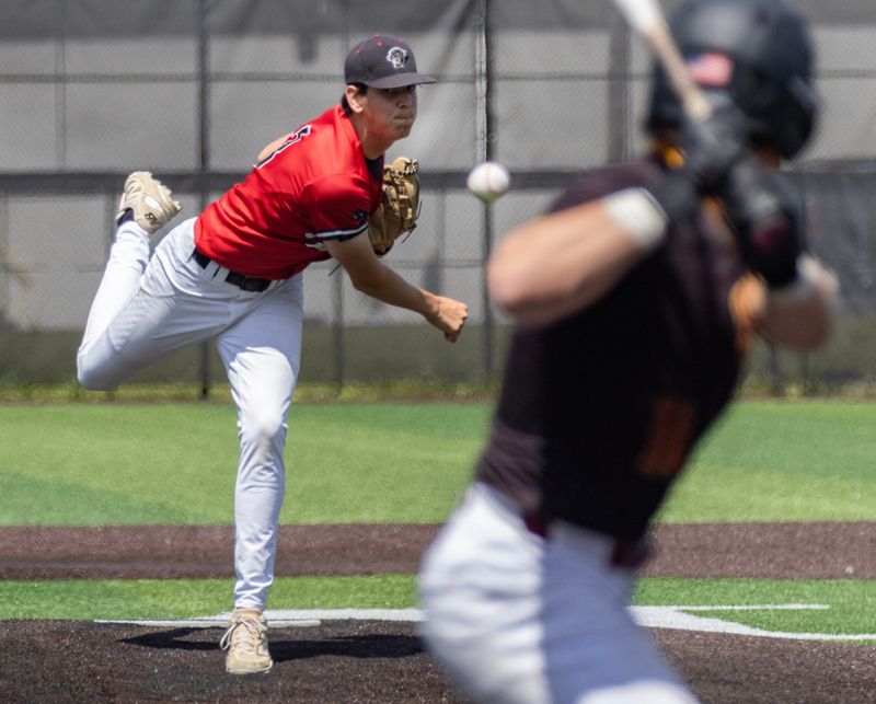 Norton pitcher Caeden DeDomenic throws against Mooney during a Division IV regional semifinal Tuesday, June 2, 2026.
