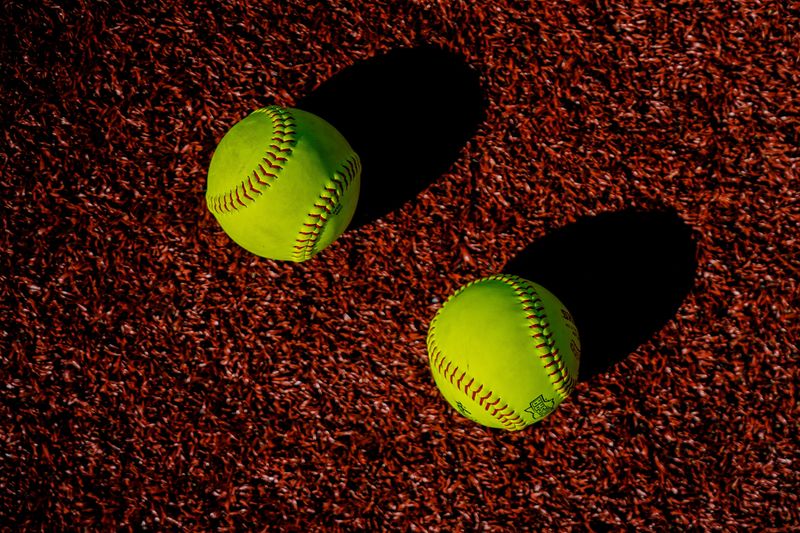 Softballs sit out before an OHSAA DI state semifinal softball game between Austintown-Fitch and Lancaster, June 3, 2026, at Firestone Stadium in Akron, Ohio.