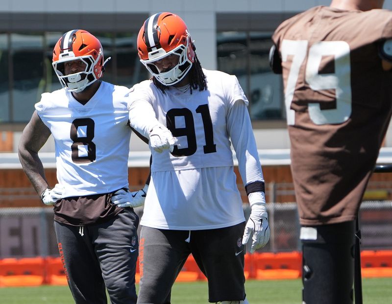 Cleveland Browns Jared Verse listens to Alex Wright as they go over a drill during the team OTAs at CrossCountry Mortgage Campus of the Cleveland Browns in Berea, Ohio on June 2, 2026.