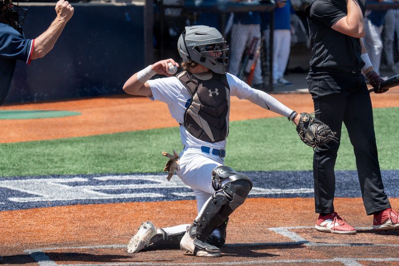 Cuyahoga Valley Christian Academy's Evan Wensel catches a strike and throws back to the pitcher during a Division III regional semifinal against Chardon in Hudson, June 3, 2026.