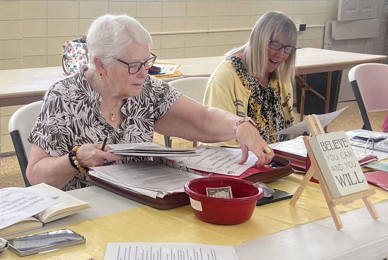 Connie Zellner (left) and Bev Kalb lead a recent Taking Off Pounds Sensibly meeting in Bucyrus. The group is open to anyone seeking encouragement and support in the weight-loss program of their choice.