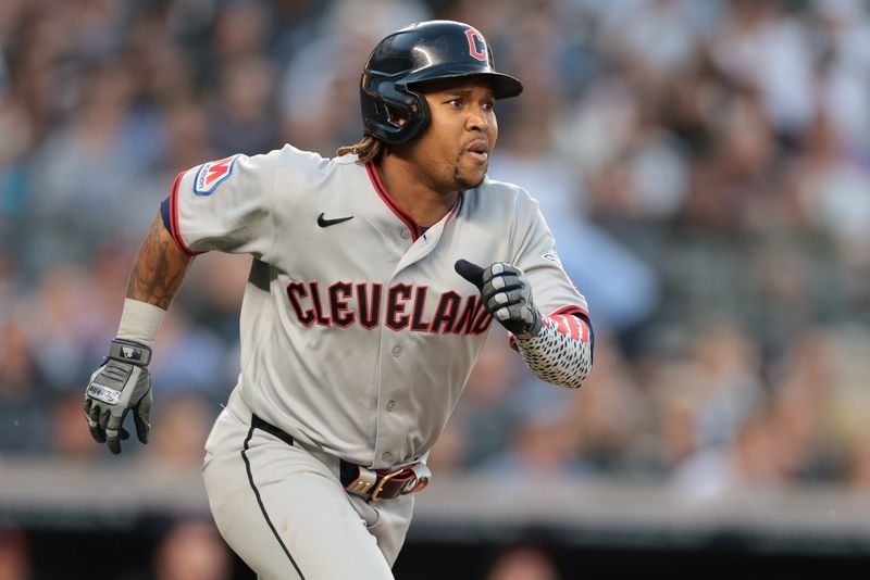 Jun 3, 2026; Bronx, New York, USA; Cleveland Guardians third baseman Jose Ramirez (11) singles during the third inning against the New York Yankees at Yankee Stadium. Mandatory Credit: Vincent Carchietta-Imagn Images