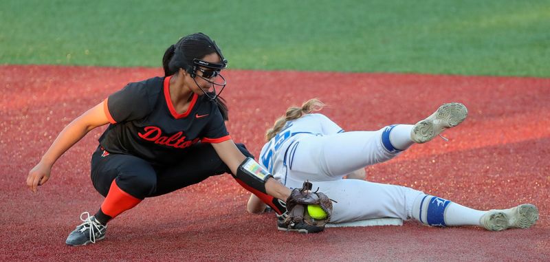 Danville outfielder Kelly Carder (55) makes it to second past Dalton shortstop Mei Simmons (4) during the sixth inning of an OHSAA Division VI state semifinal softball game at Firestone Stadium, June 3, 2026, in Akron, Ohio.