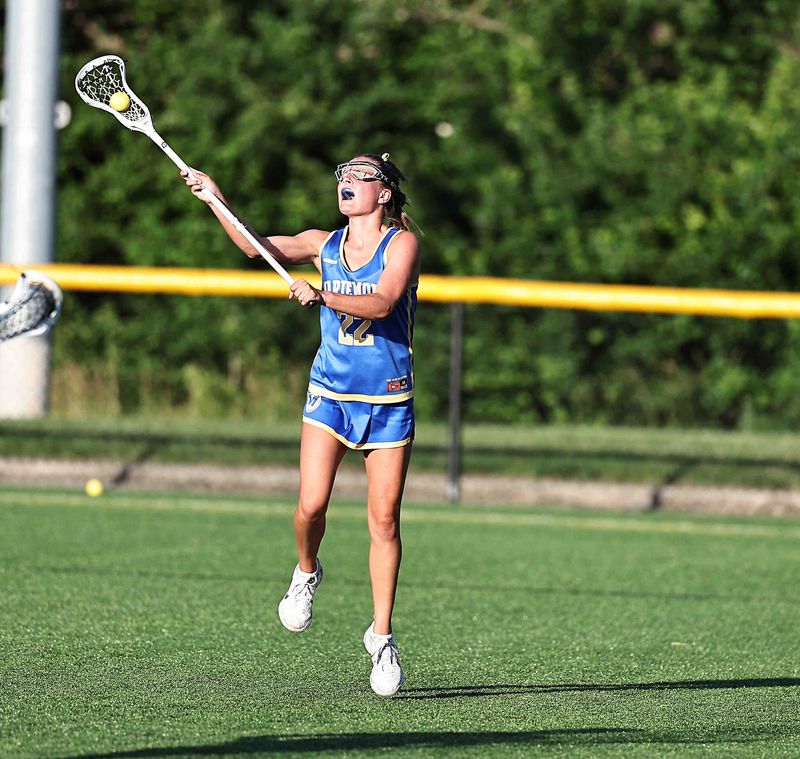 Mariemont's Charlotte Soller (22) catches the ball against Columbus DeSales during their OHSAA tournament game Wednesday, June 3, 2026.