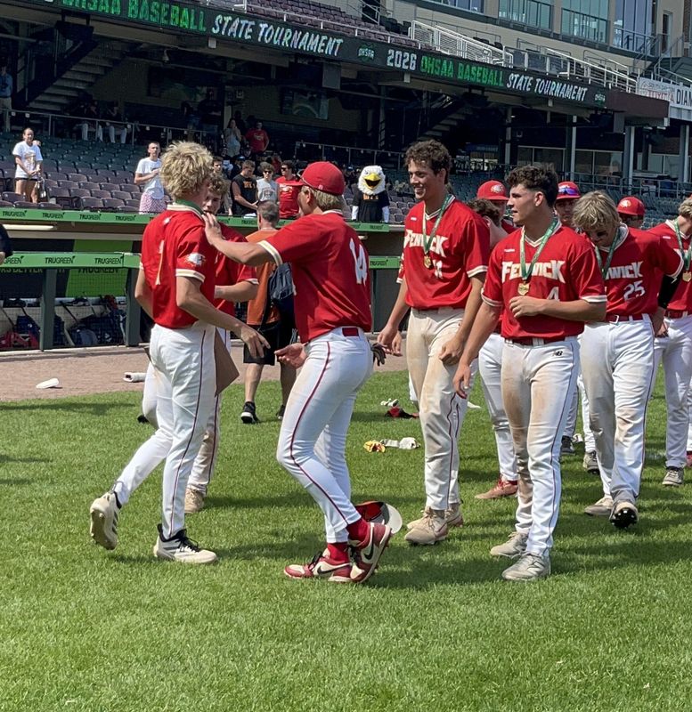 Fenwick players celebrate their Division IV regional championship after a 5-4 win over Roger Bacon June 3, 2026, at Day Air Ballpark in Dayton, Ohio.
