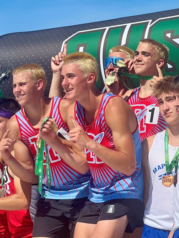From left, Riddgedale's Isaac Lust, Elliot Weston, Brogan Weston and Breyton Richmond stand atop the podium after winning the D-V 4x800-meter relay state championship June 4 at Ohio State's Jesse Owens Memorial Stadium.
