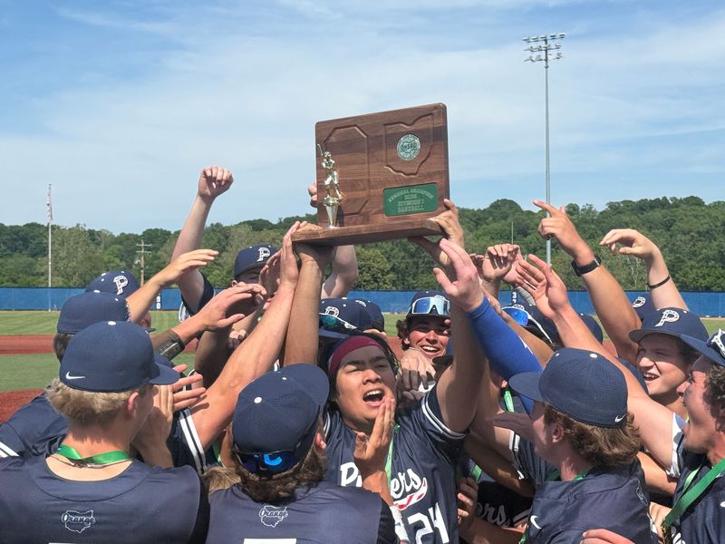 The Olentangy Orange baseball team celebrates after beating Newark 12-4 in the Division I regional title game June 4 at Beavers Field in Lancaster.