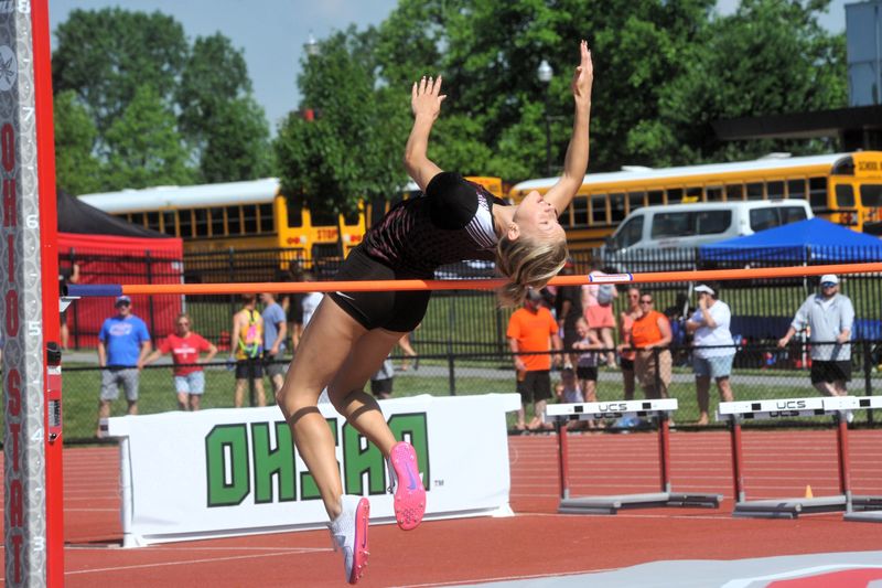 Willard's Cora Clark curls her body over the high jump bar at the OHSAA Division IV Jesse Owens State Track and Field Championships at Jesse Owens Memorial Stadium in Columbus on June 5, 2026.