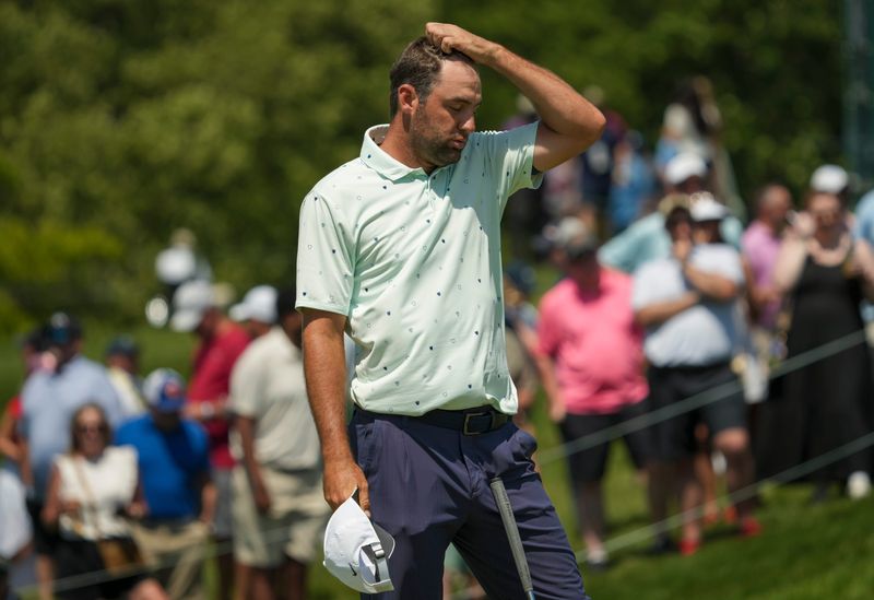 Scottie Scheffler waits to putt on 18 during the second round of the 2026 Memorial Tournament,