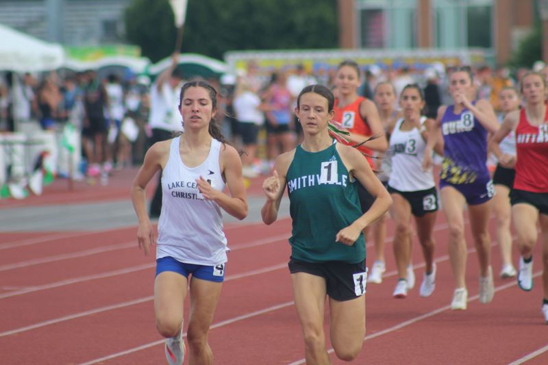 Smithville's Maryn Erdman won the Division V 800 meters on Friday at the OHSAA state track meet in Columbus at Jesse Owens Memorial Stadium. Lake Center Christian's Gianna Ritchie is right by her side.