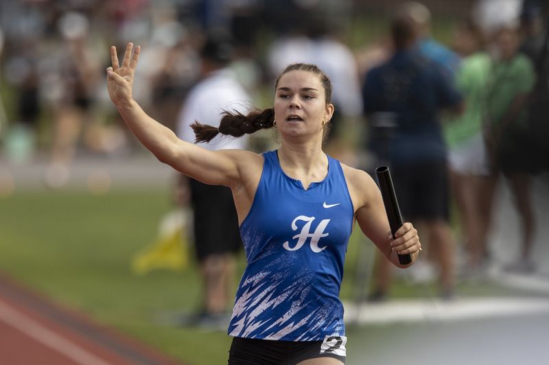 Hilliard Davidson's Celia Schulte crosses the finish line to win the Wildcats' third straight Division I state title in the girls 3,200 relay June 6 at Jesse Owens Memorial Stadium.