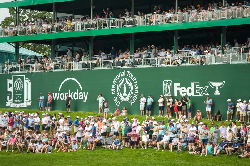Patrons watch golfers along the 14th green during the third round of the Memorial Tournament at Muirfield Village Golf Club on June 6, 2026.