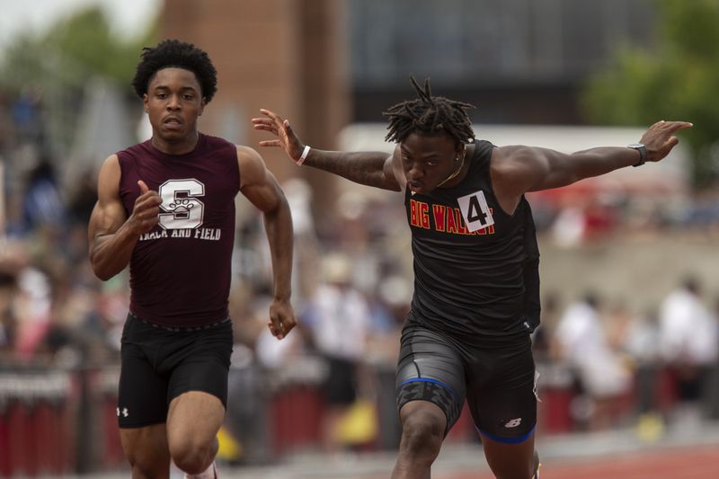 Jamier Brown, shown here winning a 100-meter semifinal heat for Big Walnut during the Division II state track and field meet in June, was seen practicing with his former football team, Huber Heights Wayne, on Aug. 4.