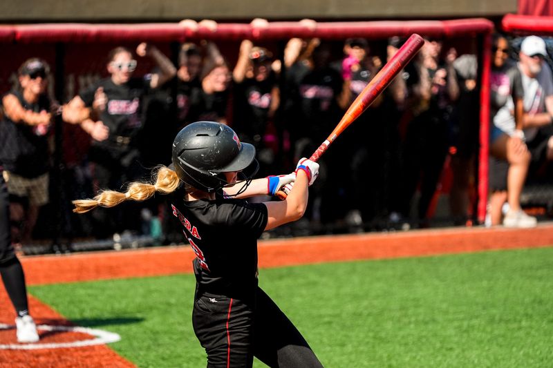 Kings’ Alexis Fera (12) hits a 3-run homer during an OHSAA DII state semifinal softball game against Painesville Riverside, June 6, 2026, at Firestone Stadium in Akron, Ohio.
