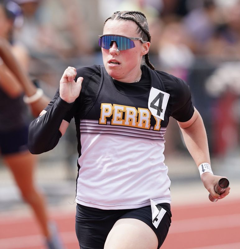 Perry’s Emerson Karrenbauer anchors the D2 4x100 meter relay prelim at the 2026 OHSAA State Track and Field Championships held at Jesse Owens Memorial Stadium in Columbus. Saturday, June 6, 2026.