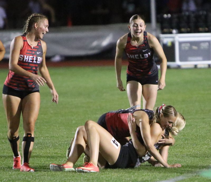 The Shelby 4x100-meter relay team of Princess Timko, Karlie Walp, Ashley Montgomery and Madison Henkel celebrate a state title at the Division III Ohio High School Athletic Association Jesse Owens State Track and Field Championships on Saturday, June 6, 2026 at Jesse Owens Memorial Stadium on the campus of The Ohio State University.