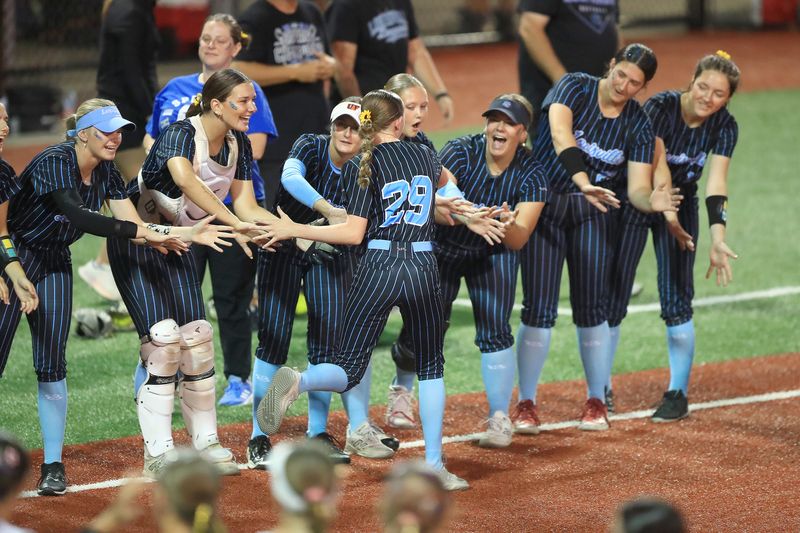 The Louisville Leopards take the field during pregame introductions for the Division III state final at Firestone Stadium in Akron, Saturday, June 6, 2026.