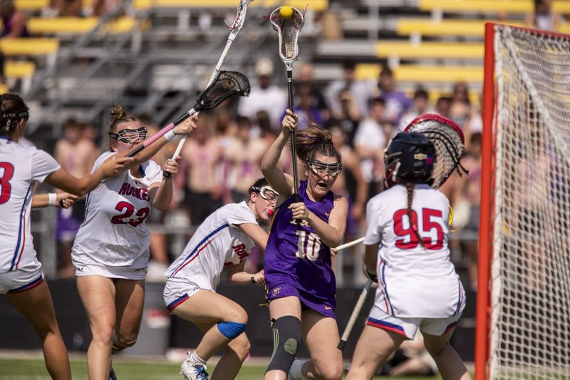 DeSales' Campbell Heald (10) zeroes in on the net during the first half of the Division II state final. Heald scored seven goals, tying the game record she set a year ago.