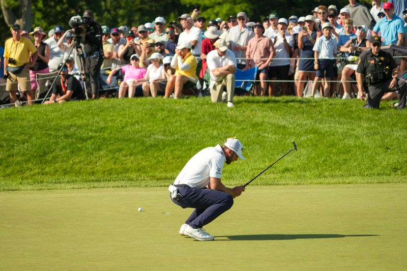 Sam Burns reacts to missing a putt on 18 during the final round of the Memorial Tournament on June 7.