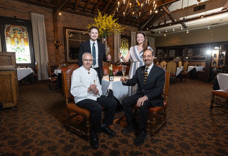 Clockwise from lower left: executive chef Richard Blondin, sommelier Clayton Young, marketing and sales manager Leah Jennings and owner Kamal Boulos at The Refectory Restaurant, which is celebrating its 50th year of operations.
