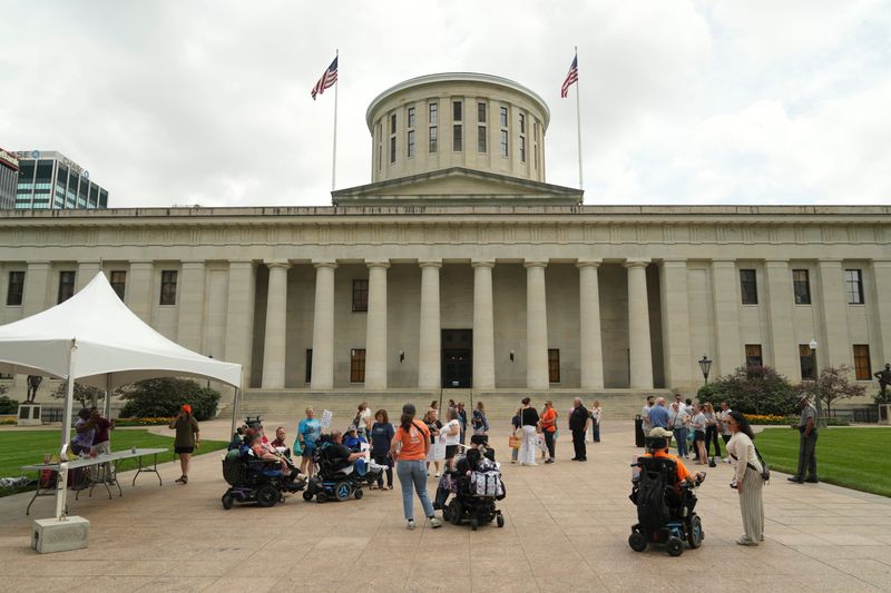Disability rights advocates protest changes to H.B. 795 that would remove Medicaid waivers for family caregivers outside the Ohio Statehouse on June 9, 2026.