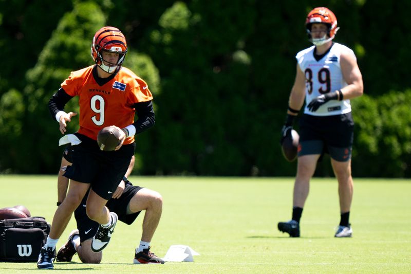 Cincinnati Bengals quarterback Joe Burrow (9) snaps the ball during spring practice on at the Kettering Practice Fields on Tuesday, June 2, 2026.