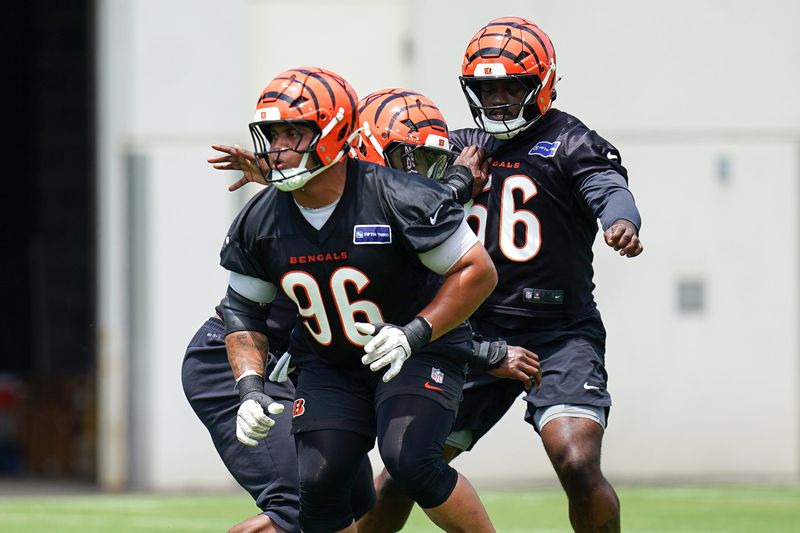 Cincinnati Bengals defensive tackle Landon Robinson (96) runs drills during practice on Tuesday, June 9, 2026, at Kettering Health Practice Fields in downtown Cincinnati.