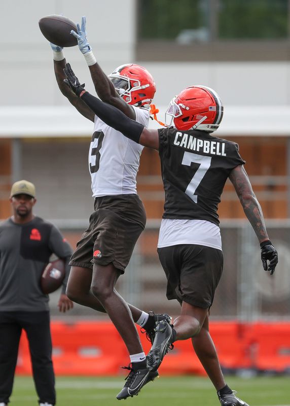 Cleveland Browns wide receiver Jerry Jeudy, left, catches a touchdown pass over cornerback Tyson Campbell during the second day of the team’s mandatory minicamp at CrossCountry Mortgage Campus, June 10, 2026, in Berea, Ohio.