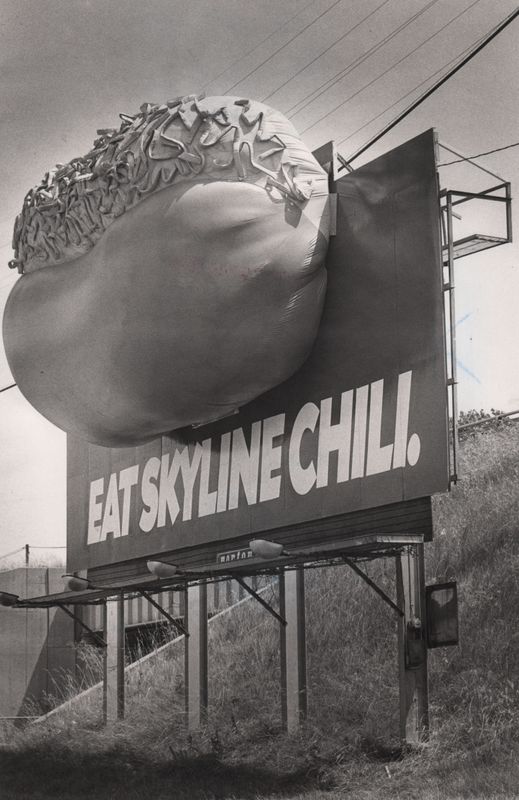 Enticing motorists, Skyline attached a giant inflated cheese coney to a billboard facing north on I-71. It measured 33 feet long and 12 feet high.