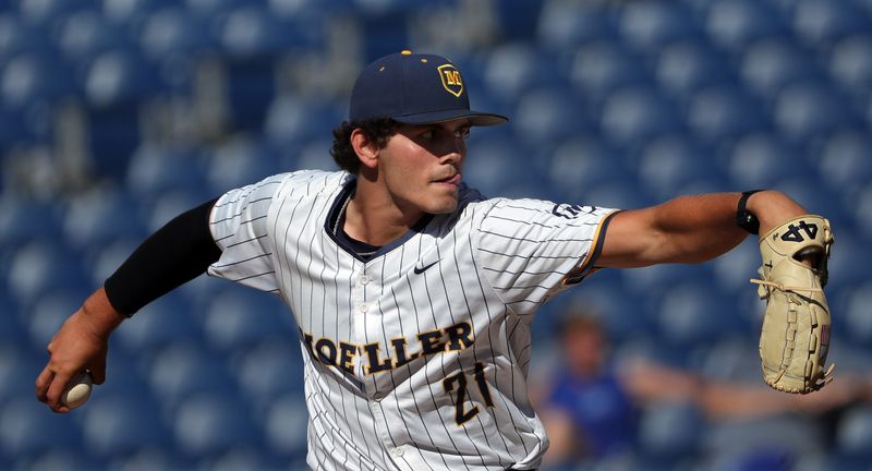 Archbishop Moeller starting pitcher Nathan McDowell (21) winds up during the first inning of an OHSAA Division I state championship baseball game at 7 17 Credit Union Park, June 12, 2026, in Akron, Ohio.