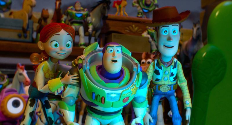 Jessie (voiced by Joan Cusack, far left), Buzz Lightyear (Tim Allen) and Woody (Tom Hanks) face an existential threat when a tablet computer enters the home in "Toy Story 5."