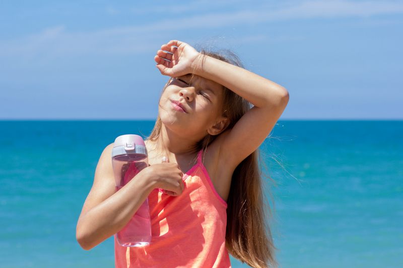 Keep kids safe this summer by recognizing heat stroke symptoms and following these essential hydration tips.