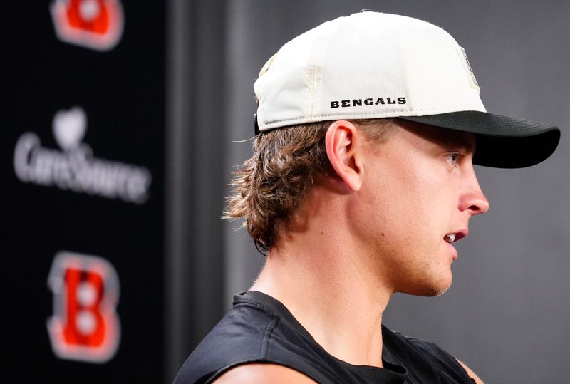 Cincinnati Bengals quarterback Joe Burrow speaks with reporters.