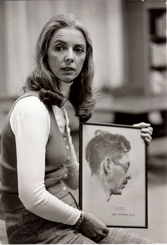 James Thurber's daughter, Rosemary Thurber, holding a drawing of James Thurber.