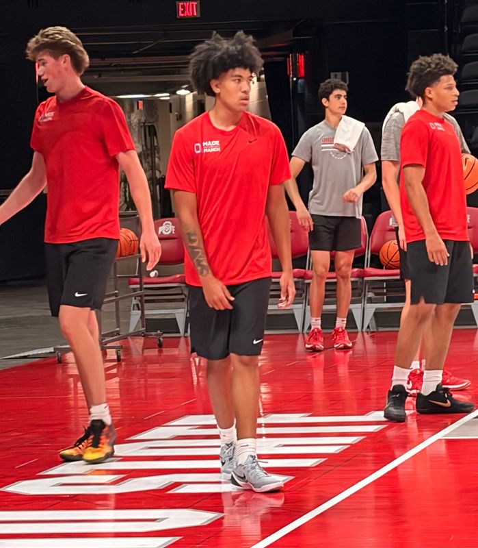 After reclassifying to the 2026 recruiting class, Ohio State guard LJ Smith (center) walks on the court at his first summer practice June 18, 2026.