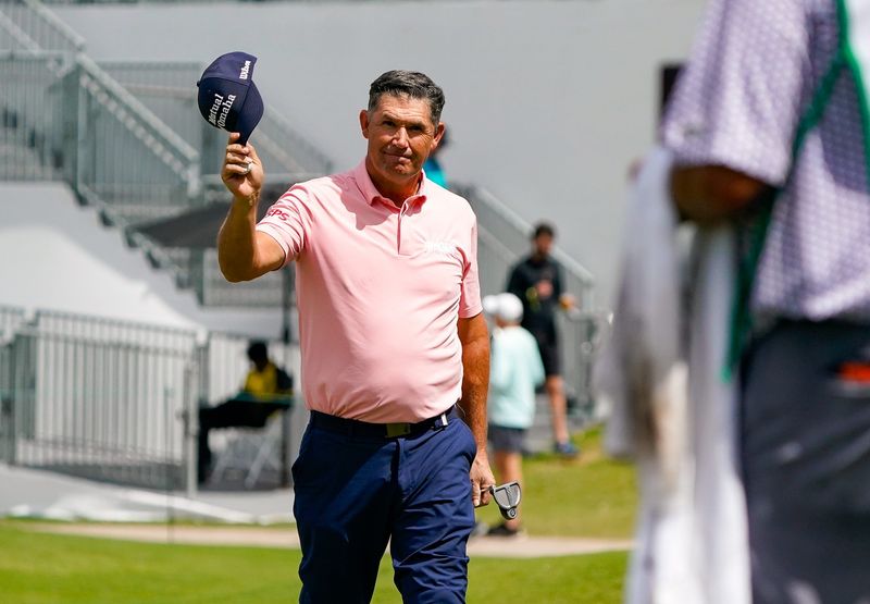 Padraig Harrington acknowledges the crowd on the 18th green during the final round of the James Hardie Pro Football Hall of Fame Invitational on March 8, 2026, in Boca Raton, Florida.