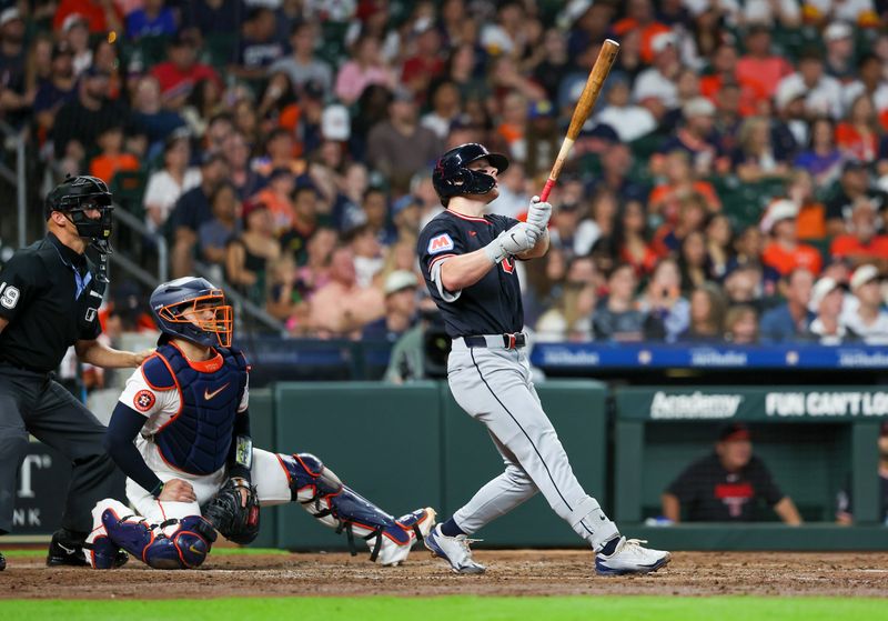 Jun 20, 2026; Houston, Texas, USA;  Cleveland Guardians second baseman Travis Bazzana (37) watches his three-run home run against the Houston Astros in the fifth inning at Daikin Park. Mandatory Credit: Thomas Shea-Imagn Images
