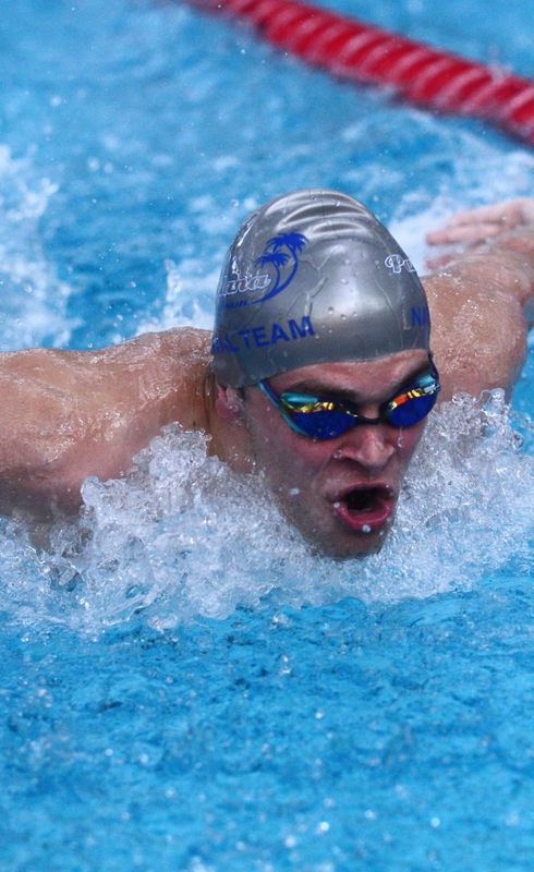 Granville graduate Nolan Schneider swims the butterfly in the 200-yard individual medley for Pau Hana during the Jill Griesse Memorial at Denison University on June 21, 2026.
