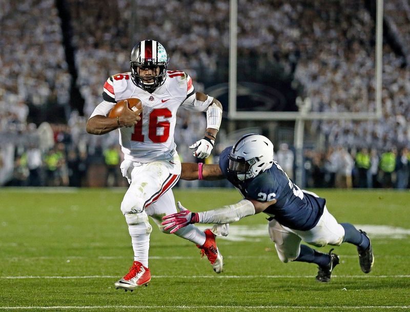 J.T. Barrett played for the Ohio State football team from 2014-17, started 44 games at quarterback and set the school record with 38 victories and set 39 individual school records.