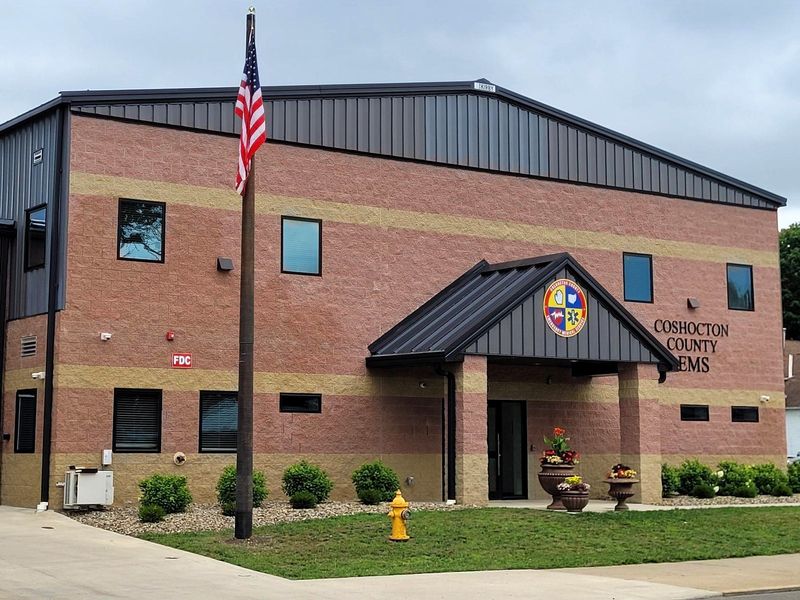 Coshocton County Emergency Medical Services recently erected a new flag pole at its station at the corner of Walnut and Seventh streets. Executive Director Todd Shroyer said the flag pole completes the facility which opened in early 2024. The pole was donated by McWane and installed by Hathaway. The flag was made by Annin Flagmakers and purchased from Auer Ace Hardware.
