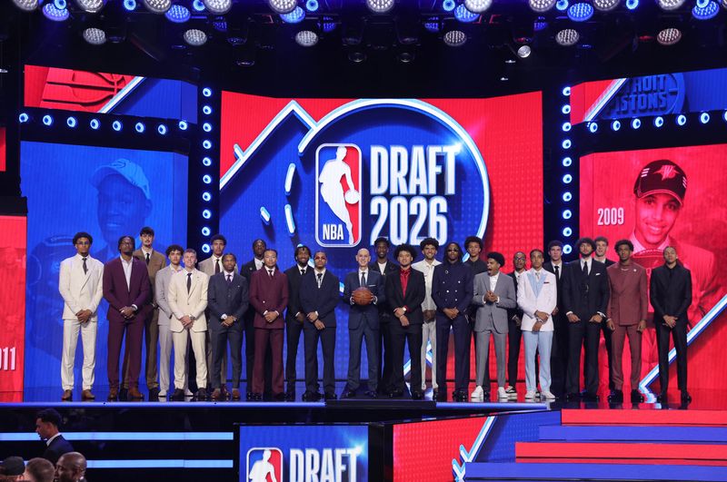 Jun 23, 2026; New York, NY, USA; NBA commissioner Adam Silver poses with 2026 draft prospects before the NBA Draft at Barclays Center.