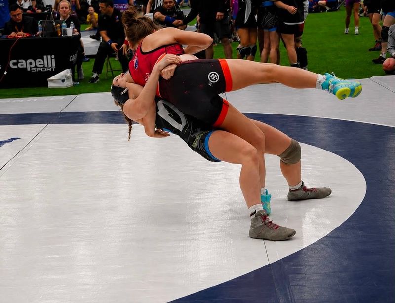 Clyde's Mimi Greenslade executes a throw at Women's National Duals in June, 2026.