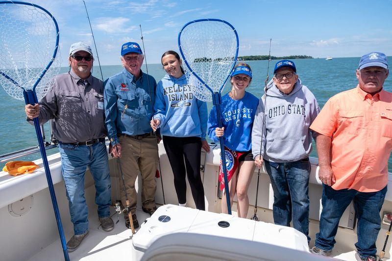 Ohio Gov. Mike DeWine, second from right, celebrates the 46th annual Governor’s Lake Erie Fish Ohio Day on June 23, 2026.