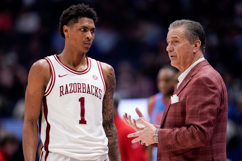 Arkansas coach John Calipari works with guard Meleek Thomas (1) during the second half of a SEC tournament semifinal game against Mississippi at Bridgestone Arena in Nashville, Tenn., Saturday, March 14, 2026.