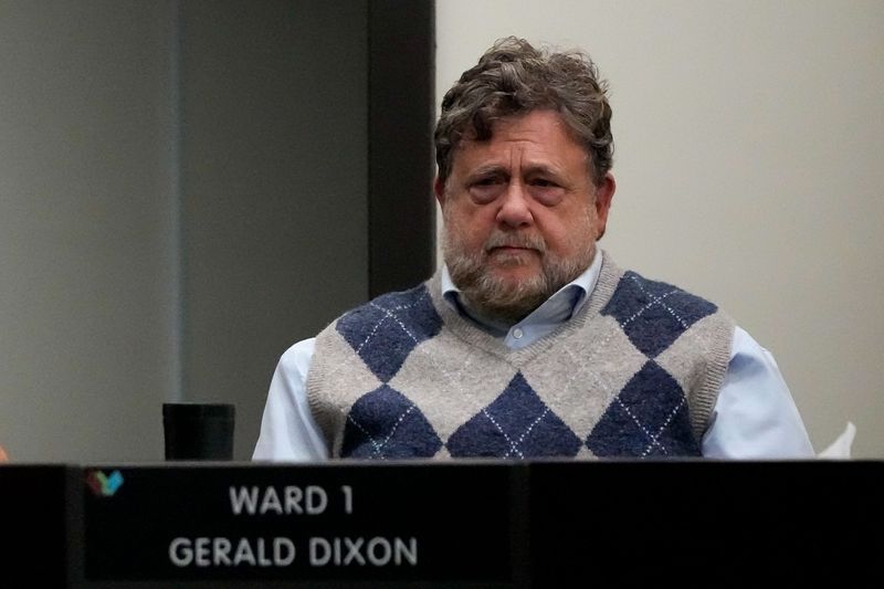 Council member Gerald Dixon  listens as Mayor Michael Bivens speaks during an emergency meeting regarding the recall election at Whitehall City Hall on Wednesday, June 24, 2026 in Columbus, Ohio.