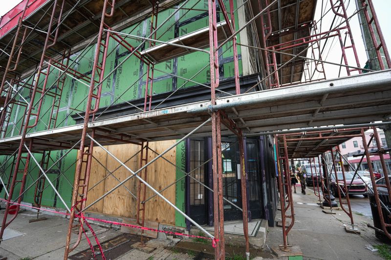 The vacant building at 4001 Hamilton Ave., which formerly housed a drug store, will be redeveloped into apartments.