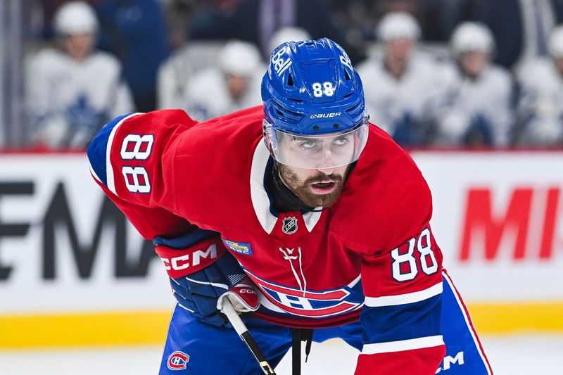 Sep 25, 2025; Montreal, Quebec, CAN; Montreal Canadiens left wing Luke Tuch (88) waits for a face-off against the Toronto Maple Leafs during the first period at Bell Centre. Mandatory Credit: David Kirouac-Imagn Images