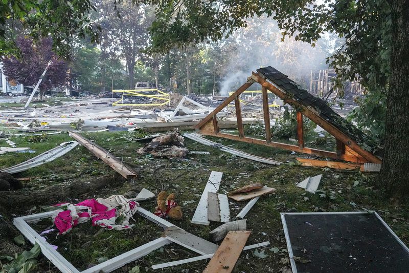 A truss and window frames are in the debris field of three homes that were destroyed  in a gas explosion on Hiram Lane in Twinsburg Township on June 26, 2026.  Crews installing fiber optic lines struck an underground gas line causing a leak which lead to the explosion destroying three houses and damaging several other homes.