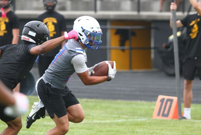 Lakewood's Lukka Vines steps past a defender on his way to score during a passing scrimmage against host Franklin Heights and Briggs on June 26, 2026.